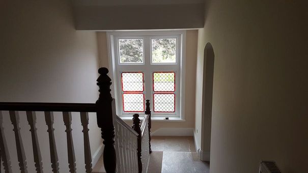Refurbished stair landing area, with a new stained glass sash window