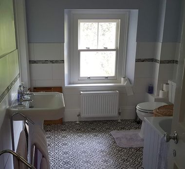 A refurbished family bathroom, with a brand new ceramic suite fitted