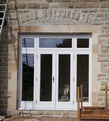 New white French patio doors fitted to a property